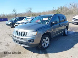2011 Jeep Compass with VIN 1J4NT1FA6BD290625, listed as a IAAI auction lot 41758224 with 53,254 mi miles. Bid and sale history available at carsss.com. Image 17.