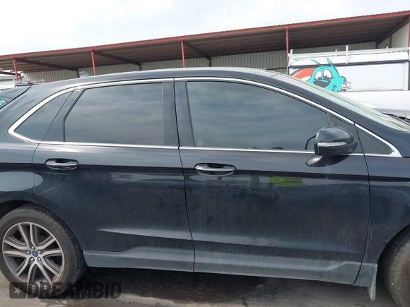 2020 Ford Edge Titanium z VIN 2FMPK3K92LBB24713, wystawiony jako IAAI lot #41949412 z przebiegiem 97 014 mil mil oraz . Historia ofert i sprzedaży dostępna na DreamBid. Obrazek 13.