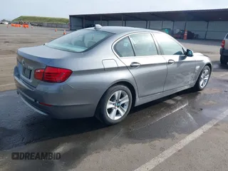 2012 BMW 5 Series 528i with VIN WBAXG5C53CDX04248, listed as a IAAI auction lot 42004099 with 197,776 mi miles. Bid and sale history available at carsss.com. Image 4.