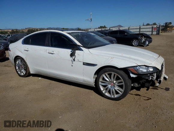 2016 Jaguar XF 35t Prestige with VIN SAJBE4BVXGCY02950, listed as a Copart auction lot 66197884 with 51,616 mi miles and Salvage Title. Bid and sale history available at carsss.com. Image 4.
