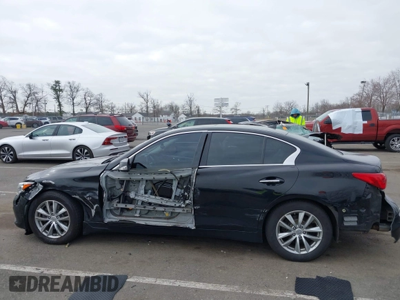 2015 Infiniti Q50 z VIN JN1BV7AR6FM412573, wystawiony jako IAAI lot #41796802 z przebiegiem 136 410 mil mil oraz . Historia ofert i sprzedaży dostępna na DreamBid. Obrazek 14.