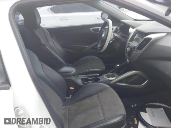2013 Hyundai Veloster w/Black Int с VIN KMHTC6AD5DU166601, выставлен на аукционе IAAI как лот 42182995 с пробегом 143 106 миль миль и . История ставок и продаж доступна на DreamBid. Изображение 5.