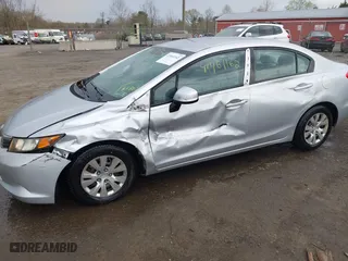 2012 Honda Civic Sdn LX with VIN 19XFB2F50CE353837, listed as a IAAI auction lot 41961162 with 140,583 mi miles. Bid and sale history available at carsss.com. Image 6.