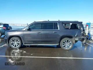 2017 Chevrolet Suburban Premier z VIN 1GNSKJKC0HR274605, wystawiony jako IAAI lot #41828392 z przebiegiem 144 747 mil mil oraz . Historia ofert i sprzedaży dostępna na DreamBid. Obrazek 14.