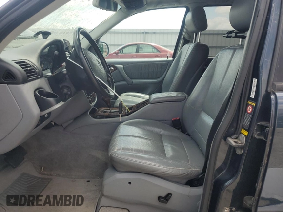 2000 Mercedes-Benz M 320/430/500 with VIN 4JGAB72E7YA168445, listed as a Copart auction lot 59401235 with 231,591 mi miles and Salvage title. Bid and sale history available at DreamBid. Image 7.