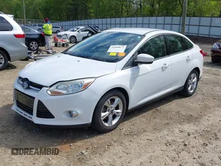 2012 Ford Focus SE with VIN 1FAHP3F2XCL122141, listed as a IAAI auction lot 42008877 with 122,743 mi miles. Bid and sale history available at carsss.com. Image 2.