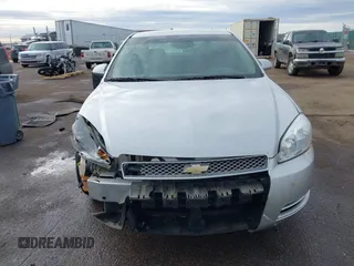 2013 Chevrolet Impala LS with VIN 2G1WF5E31D1154096, listed as a IAAI auction lot 41649749 with 204,860 mi miles and . Bid and sale history available at DreamBid. Image 13.