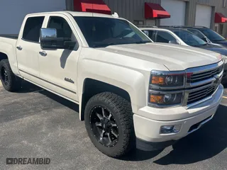 2015 Chevrolet Silverado 1500 High Country with VIN 3GCUKTEC4FG142789, listed as a Copart auction lot 51507825 with 218,796 mi miles and Clean Title. Bid and sale history available at carsss.com. Image 1.