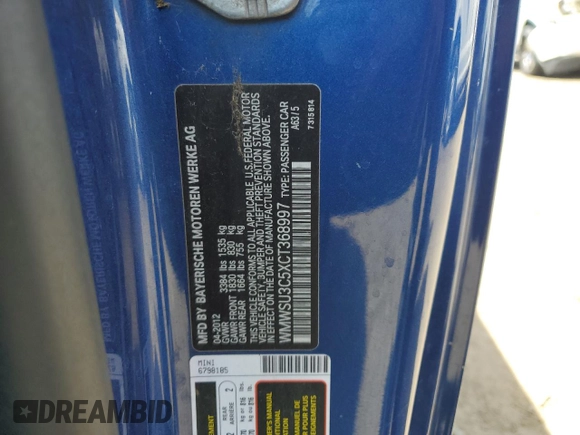 2012 MINI Hardtop z VIN WMWSU3C5XCT368997, wystawiony jako Copart lot #54622735 z przebiegiem 104 261 mil mil oraz Szkoda całkowita • Salvage title. Historia ofert i sprzedaży dostępna na DreamBid. Obrazek 12.