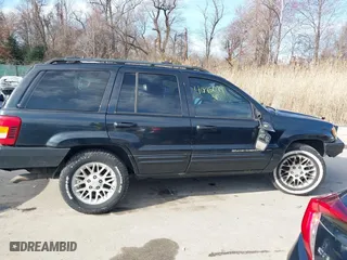 2004 Jeep Grand Cherokee Limited with VIN 1J4GW58N74C120435, listed as a IAAI auction lot 41815094 with 193,056 mi miles. Bid and sale history available at carsss.com. Image 13.