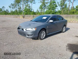 2010 Mitsubishi Lancer ES z VIN JA32U2FUXAU018940, wystawiony jako IAAI lot #42481450 z przebiegiem 180 872 mil mil oraz . Historia ofert i sprzedaży dostępna na DreamBid. Obrazek 2.
