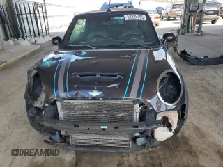 2014 MINI Convertible S with VIN WMWZP3C55ET706573, listed as a Copart auction lot 52325705 with 125,076 mi miles and Salvage Title. Bid and sale history available at DreamBid. Image 5.