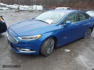 2018 Ford Fusion Hybrid Titanium with VIN 3FA6P0RU5JR141536, listed as a IAAI auction lot 41168269 with 54,754 mi miles. Bid and sale history available at carsss.com. Image 2.