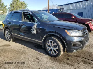 2014 Volkswagen Touareg X z VIN WVGEP9BP5ED008560, wystawiony jako Copart lot #52767595 z przebiegiem Nie podano mil oraz Szkoda całkowita • Salvage title. Historia ofert i sprzedaży dostępna na DreamBid. Obrazek 4.