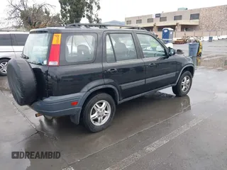 1999 Honda CR-V EX with VIN JHLRD1766XC007185, listed as a IAAI auction lot 41534901 with 271,063 mi miles. Bid and sale history available at carsss.com. Image 4.