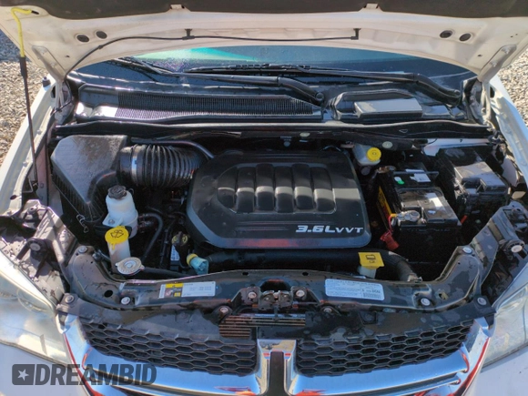 2013 Dodge Grand Caravan Crew with VIN 2C4RDGDG6DR549225, listed as a Copart auction lot 49479425 with 111,012 mi miles and Salvage Title. Bid and sale history available at DreamBid. Image 12.