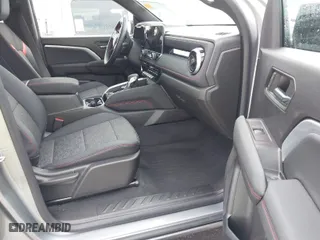 2023 Chevrolet Colorado 4WD Z71 with VIN 1GCPTDEK6P1137701, listed as a IAAI auction lot 40774940 with 10,818 mi miles. Bid and sale history available at carsss.com. Image 5.