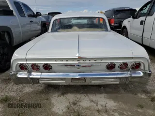 1964 Chevrolet Impala с VIN 41847J219664, выставлен на аукционе Copart как лот 75891214 с пробегом 47 312 миль миль и Списание • Salvage title. История ставок и продаж доступна на DreamBid. Изображение 6.