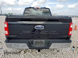 2022 Ford F-150 XL with VIN 1FTMF1C59NKF26135, listed as a Copart auction lot 60034745 with 57,430 mi miles and Salvage title. Bid and sale history available at DreamBid. Image 6.