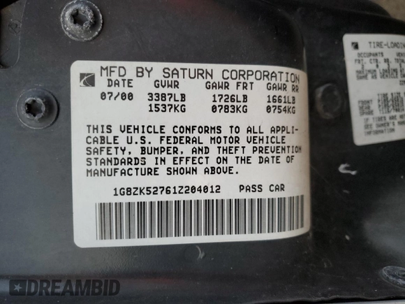2001 Saturn SL z VIN 1G8ZK52761Z204012, wystawiony jako Copart lot #86618384 z przebiegiem 99 674 mil mil oraz Szkoda całkowita • Salvage title. Historia ofert i sprzedaży dostępna na DreamBid. Obrazek 12.