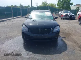 2006 Nissan Altima S z VIN 1N4AL11D96C242480, wystawiony jako IAAI lot #42265681 z przebiegiem 168 449 mil mil oraz . Historia ofert i sprzedaży dostępna na DreamBid. Obrazek 12.