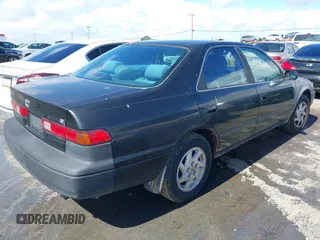 1997 Toyota Camry LE z VIN JT2BG22K3V0048428, wystawiony jako IAAI lot #41817586 z przebiegiem 349 369 mil mil oraz . Historia ofert i sprzedaży dostępna na DreamBid. Obrazek 4.