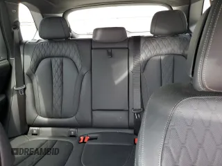 2023 BMW X5 xDrive45e z VIN 5UXTA6C01P9R61137, wystawiony jako Copart lot #56458155 z przebiegiem 27 501 mil mil oraz Szkoda całkowita • Salvage title. Historia ofert i sprzedaży dostępna na DreamBid. Obrazek 10.