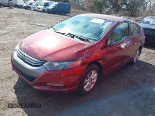 2010 Honda Insight EX with VIN JHMZE2H78AS032088, listed as a IAAI auction lot 41694387 with 145,776 mi miles and . Bid and sale history available at DreamBid. Image 2.