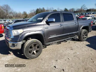 2015 Toyota Tundra Limited with VIN 5TFHW5F11FX452201, listed as a Copart auction lot 88199755 with 107,320 mi miles and Salvage title. Bid and sale history available at DreamBid. Image 1.