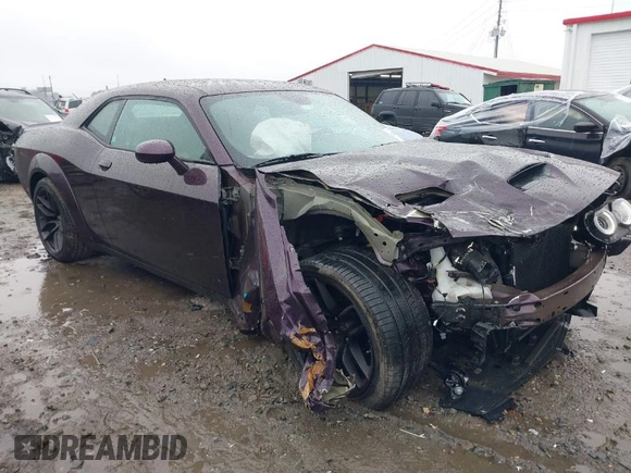 2021 Dodge Challenger R/T Scat Pack z VIN 2C3CDZFJ2MH586535, wystawiony jako IAAI lot #41224949 z przebiegiem 32 977 mil mil oraz . Historia ofert i sprzedaży dostępna na DreamBid. Obrazek 1.