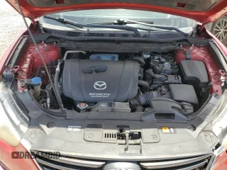 2016 Mazda CX-5 Sport с VIN JM3KE2BY4G0638102, выставлен на аукционе Copart как лот 56724445 с пробегом 189 235 миль миль и Списание • Salvage title. История ставок и продаж доступна на DreamBid. Изображение 12.