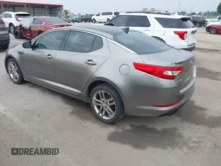 2013 Kia Optima SX with VIN 5XXGR4A62DG105805, listed as a IAAI auction lot 42492169 with 134,908 mi miles and . Bid and sale history available at DreamBid. Image 3.