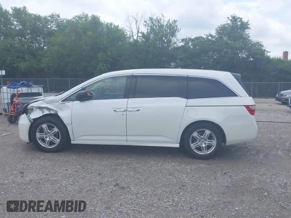 2013 Honda Odyssey Touring with VIN 5FNRL5H9XDB049390, listed as a IAAI auction lot 42532861 with 129,376 mi miles and . Bid and sale history available at DreamBid. Image 15.