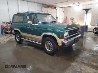 1987 Ford Bronco z VIN 1FMCU14T8HUA51662, wystawiony jako Copart lot #74972024 z przebiegiem 26 362 mil mil oraz Szkoda całkowita • Salvage title. Historia ofert i sprzedaży dostępna na DreamBid. Obrazek 4.