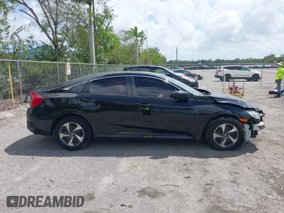 2020 Honda Civic LX z VIN 2HGFC2F61LH600469, wystawiony jako IAAI lot #41958201 z przebiegiem 66 249 mil mil oraz . Historia ofert i sprzedaży dostępna na DreamBid. Obrazek 14.
