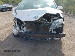 2014 Toyota Sienna LE AAS with VIN 5TDKK3DC0ES439163, listed as a IAAI auction lot 42155274 with Not provided miles and . Bid and sale history available at DreamBid. Image 6.