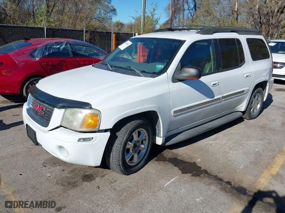 2003 GMC Envoy XL SLT with VIN 1GKET16S136145209, listed as a IAAI auction lot 40862083 with 244,923 mi miles. Bid and sale history available at carsss.com. Image 2.