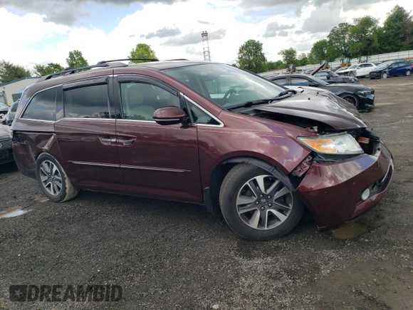 2015 Honda Odyssey Touring Elite with VIN 5FNRL5H98FB033336, listed as a Copart auction lot 57092355 with 186,046 mi miles and Salvage title. Bid and sale history available at DreamBid. Image 4.