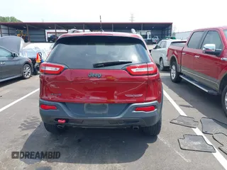 2014 Jeep Cherokee Trailhawk with VIN 1C4PJMBS7EW162357, listed as a IAAI auction lot 42601903 with 104,768 mi miles and . Bid and sale history available at DreamBid. Image 16.