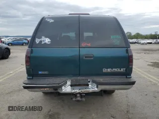 1999 Chevrolet Suburban with VIN 1GNFK16R9XJ516000, listed as a Copart auction lot 73854994 with 263,079 mi miles and Salvage Title. Bid and sale history available at carsss.com. Image 6.