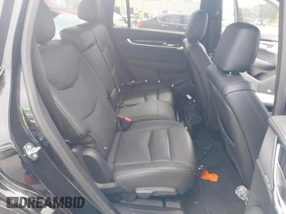 2023 Cadillac XT6 FWD Premium Luxury with VIN 1GYKPCRS6PZ106284, listed as a IAAI auction lot 41595617 with 32,795 mi miles and . Bid and sale history available at DreamBid. Image 8.