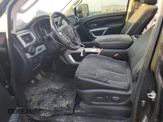 2019 Nissan Titan Pro-4X z VIN 1N6AA1E53KN525603, wystawiony jako Copart lot #77336264 z przebiegiem 64 507 mil mil oraz Szkoda całkowita • Salvage title. Historia ofert i sprzedaży dostępna na DreamBid. Obrazek 7.