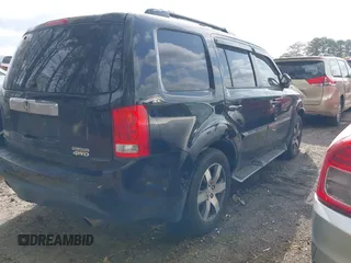 2012 Honda Pilot Touring with VIN 5FNYF4H92CB051260, listed as a IAAI auction lot 41906802 with 256,691 mi miles. Bid and sale history available at carsss.com. Image 4.