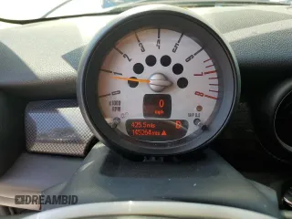 2014 MINI Clubman S z VIN WMWZG3C50ET801008, wystawiony jako Copart lot #57430295 z przebiegiem 145 264 mil mil oraz Szkoda całkowita • Salvage title. Historia ofert i sprzedaży dostępna na DreamBid. Obrazek 9.