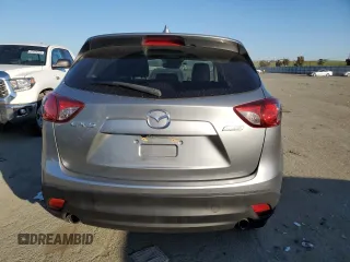 2014 Mazda CX-5 Grand Touring with VIN JM3KE2DY8E0412025, listed as a Copart auction lot 42863655 with 72,416 mi miles and Salvage Title. Bid and sale history available at carsss.com. Image 6.