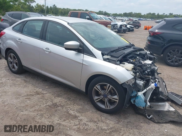 2018 Ford Focus SE z VIN 1FADP3FE4JL214013, wystawiony jako IAAI lot #42180138 z przebiegiem 72 550 mil mil oraz . Historia ofert i sprzedaży dostępna na DreamBid. Obrazek 1.