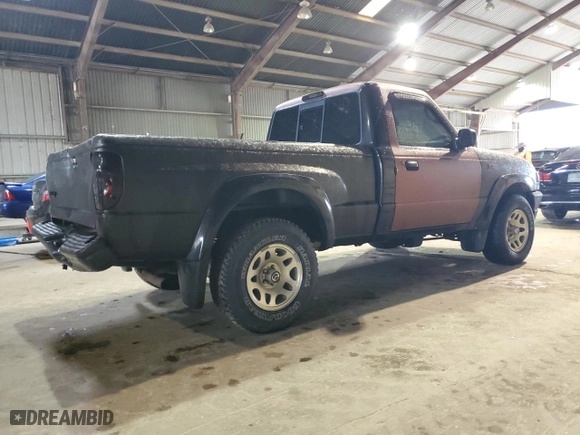 2001 Mazda B-Series 2WD Truck DS with VIN 4F4YR12U01TM28382, listed as a Copart auction lot 77695604 with 165,103 mi miles and Salvage Title. Bid and sale history available at carsss.com. Image 3.