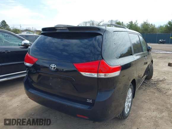 2013 Toyota Sienna XLE with VIN 5TDDK3DC9DS064154, listed as a IAAI auction lot 41898401 with 175,013 mi miles and . Bid and sale history available at DreamBid. Image 4.