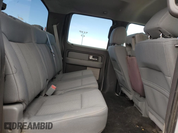2014 Ford F-150 XL with VIN 1FTFW1ET2EFB47717, listed as a Copart auction lot 49323155 with 141,969 mi miles and Salvage title. Bid and sale history available at DreamBid. Image 11.