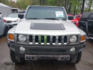 2006 Hummer H3 with VIN 5GTDN136168189138, listed as a IAAI auction lot 42012951 with 209,548 mi miles. Bid and sale history available at carsss.com. Image 6.